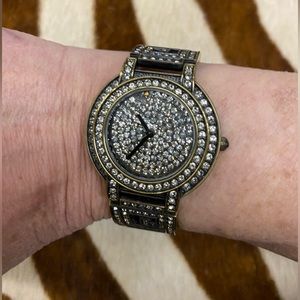 Heidi Daus watch with Crystals and an extension. Needs a battery. open to offers